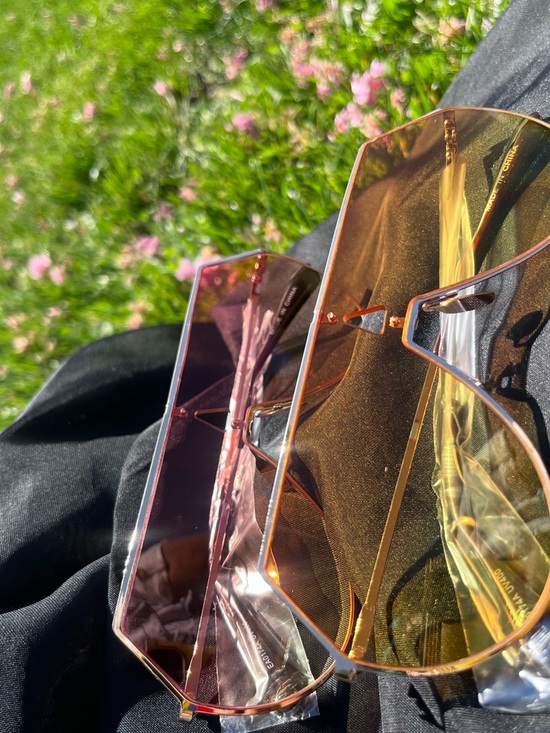 StylesByNikkie Accessories - Rimless Geometric Sunglasses - Pink & yellow Lenses with gold trim.